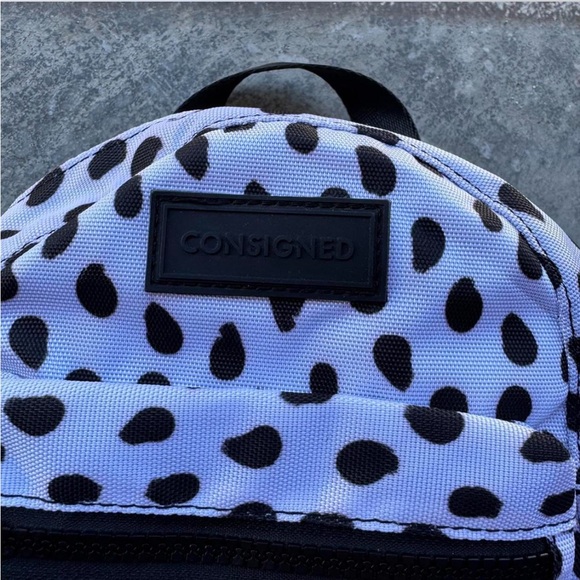 White and black mini backpack with adjustable straps. Cow print. - Picture 2 of 4